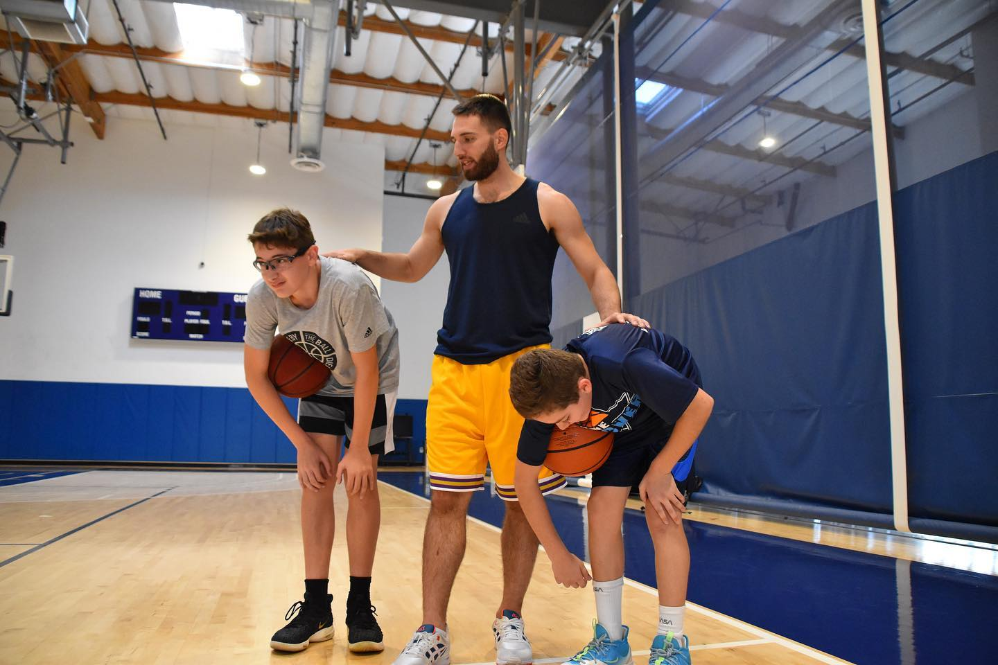 Coach Spencer Levy training UYP basketball players in Irvine